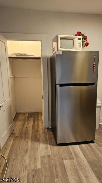 16 Main Street, Unit A Netcong, NJ 07857 - Photo 6 of 12 a white refrigerator freezer sitting in a kitchen