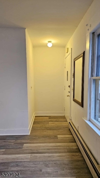 16 Main Street, Unit A Netcong, NJ 07857 - Photo 8 of 12 a view of a room with wooden floor and brick walls