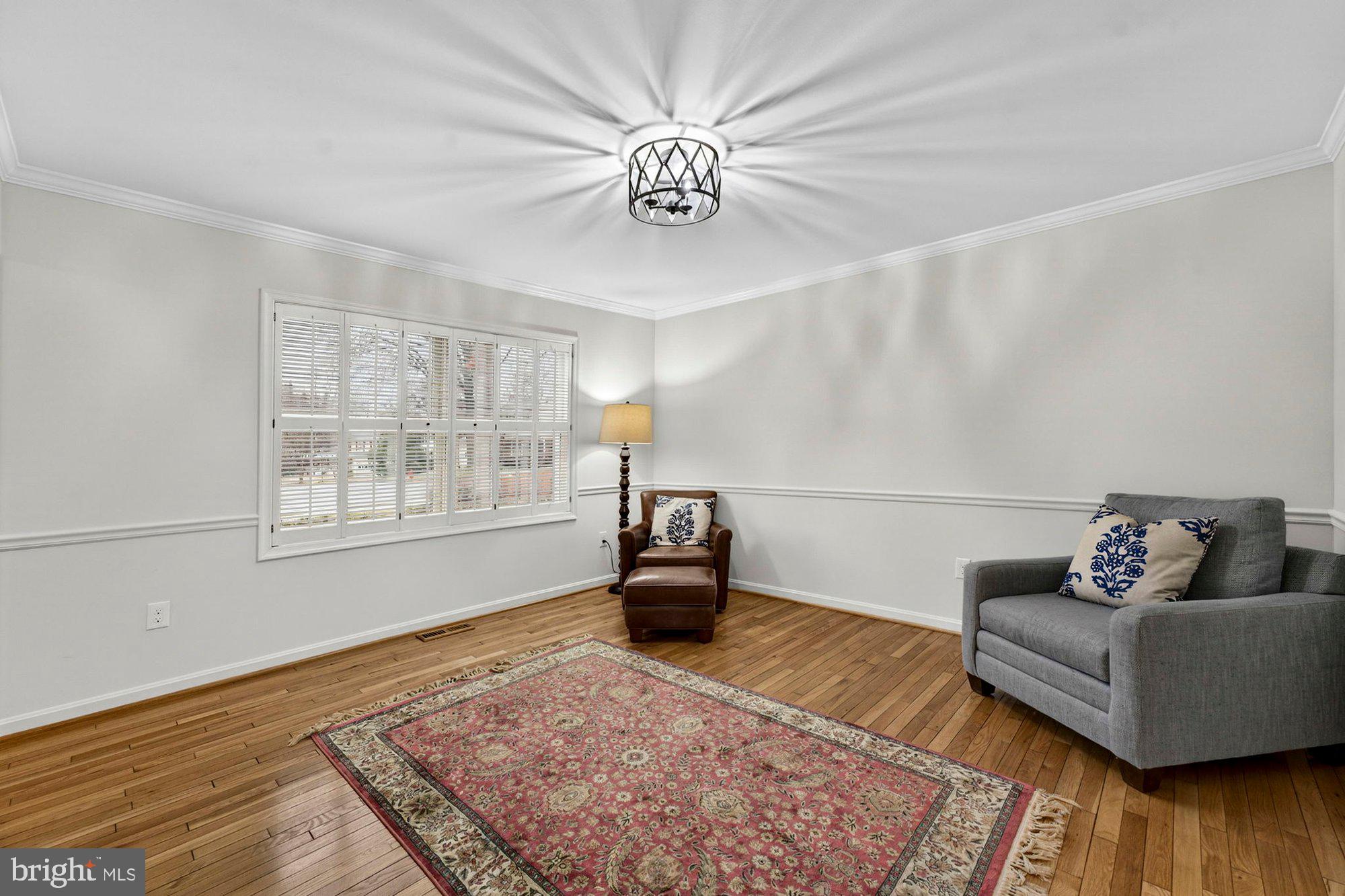 930 Park Street Vienna, VA 22180 - Photo 12 of 83 a living room with furniture and a rug