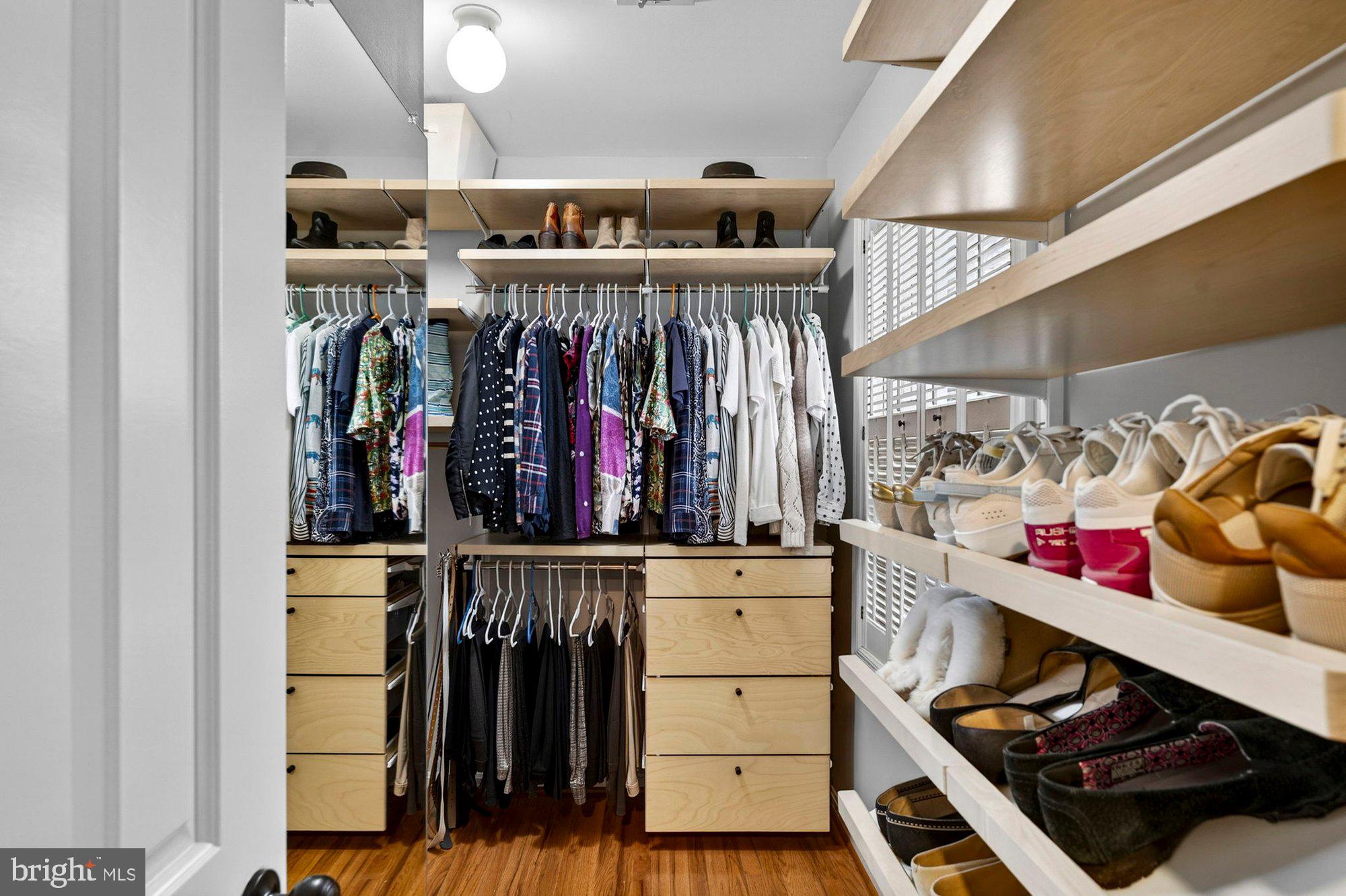 930 Park Street Vienna, VA 22180 - Photo 44 of 83 a view of walk in closet with clothes and shoes