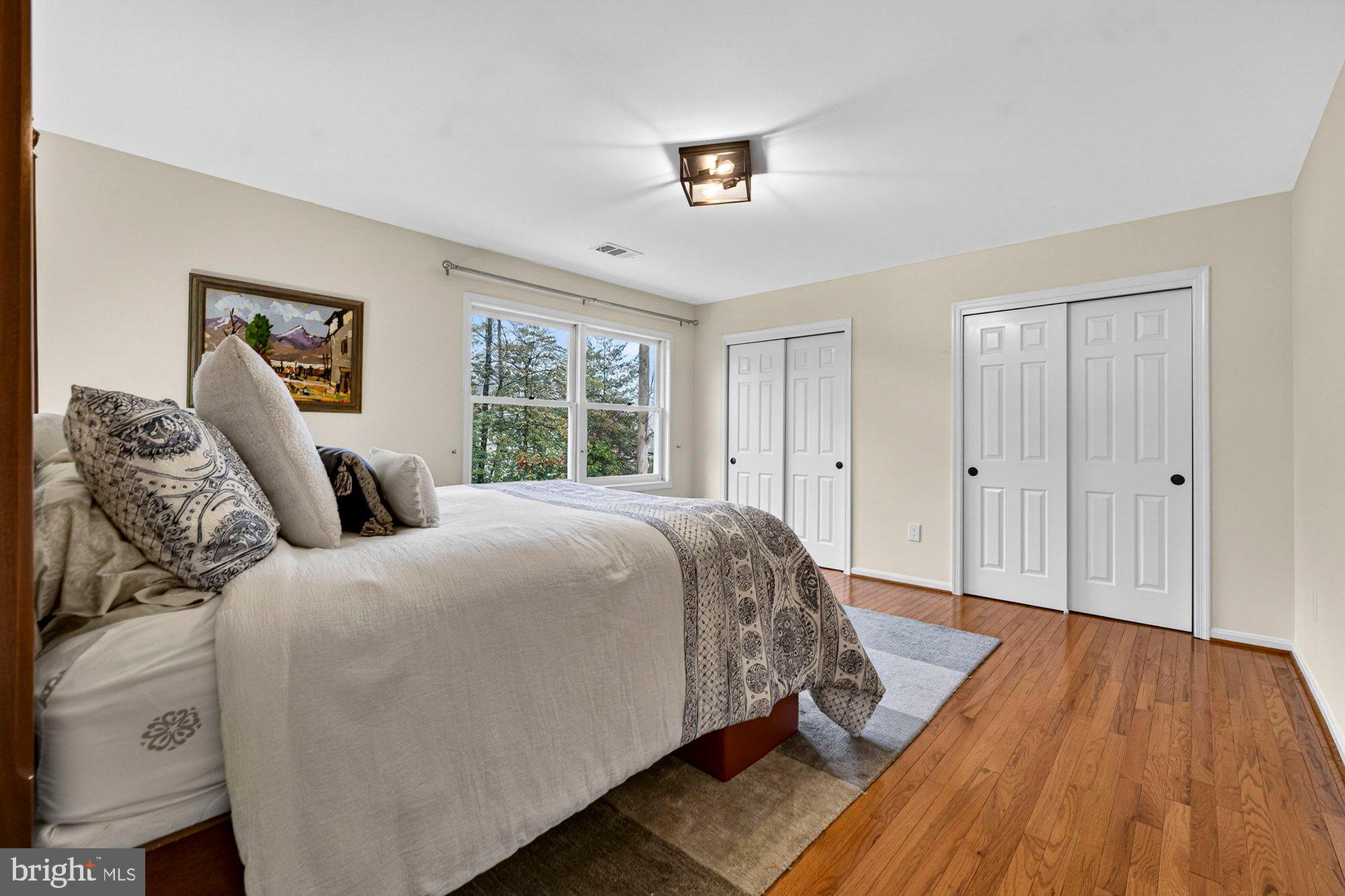 930 Park Street Vienna, VA 22180 - Photo 51 of 83 a bedroom with a large bed and a window