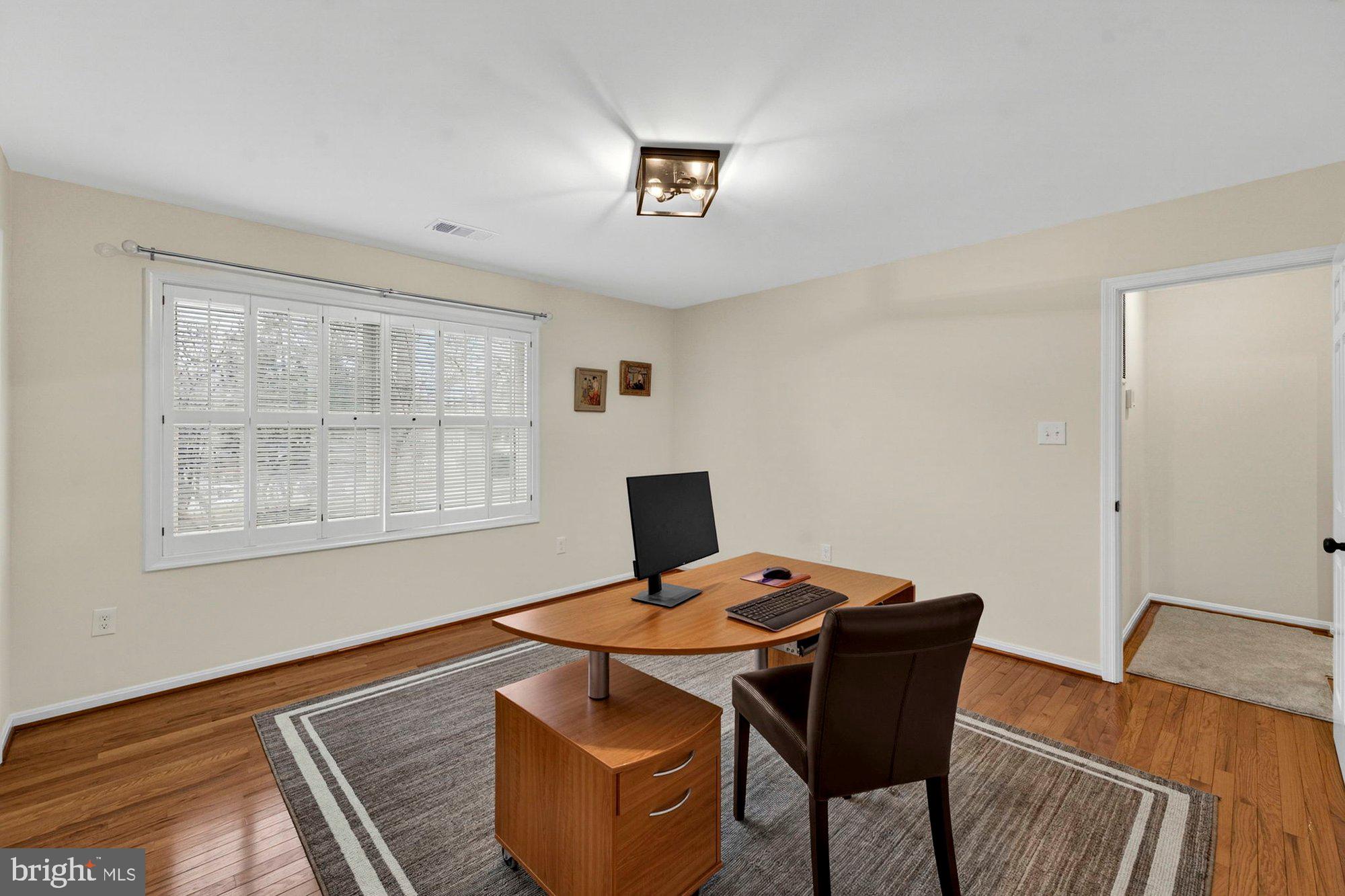 930 Park Street Vienna, VA 22180 - Photo 53 of 83 a workspace with furniture and window