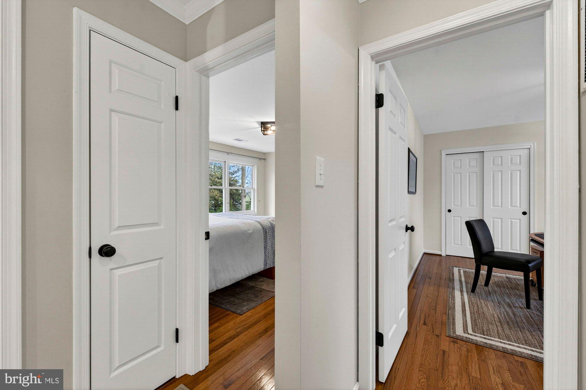 930 Park Street Vienna, VA 22180 - Photo 56 of 83 a view of a hallway with dining room and hallway with wooden floor