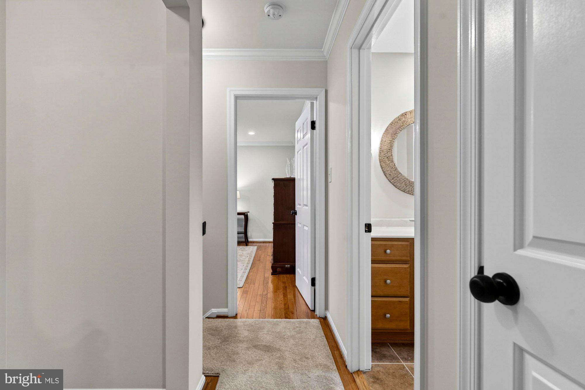 930 Park Street Vienna, VA 22180 - Photo 57 of 83 a view of a hallway with wooden floor and staircase