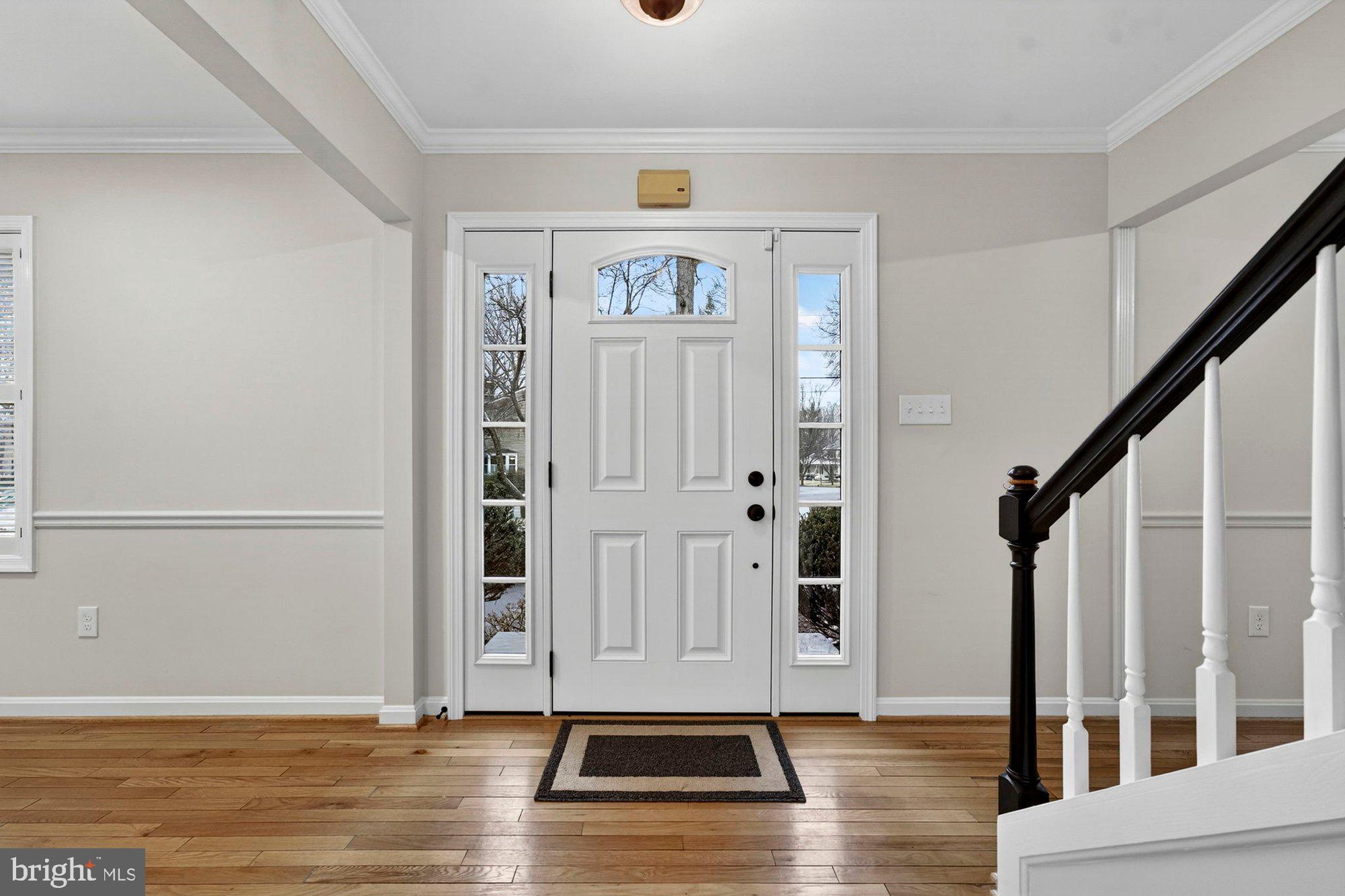 930 Park Street Vienna, VA 22180 - Photo 6 of 83 a view of an entryway with wooden floor and door