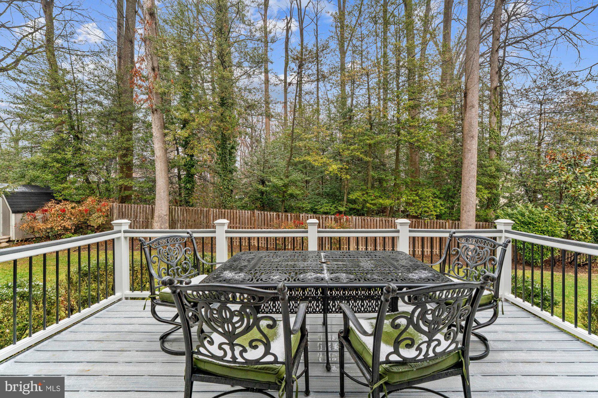 930 Park Street Vienna, VA 22180 - Photo 74 of 83 a view of a deck with two chairs and wooden floor