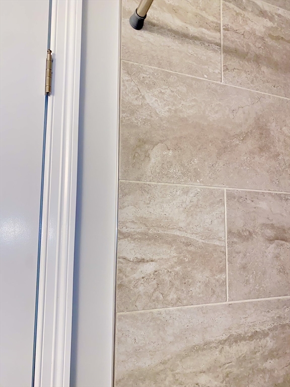 635 Old Post Road, Unit 2203 Sharon, MA 02067 - Photo 14 of 40 a bathroom with a shower