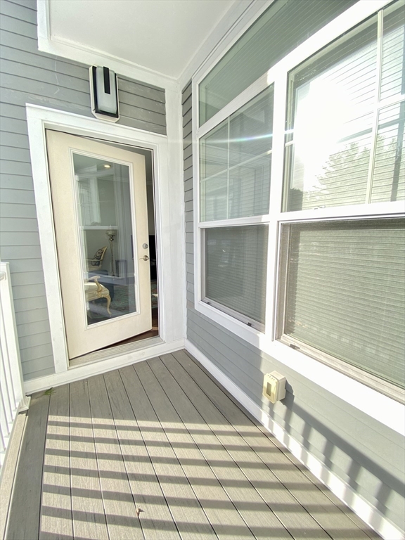 635 Old Post Road, Unit 2203 Sharon, MA 02067 - Photo 19 of 40 a view of a door of a house with a window