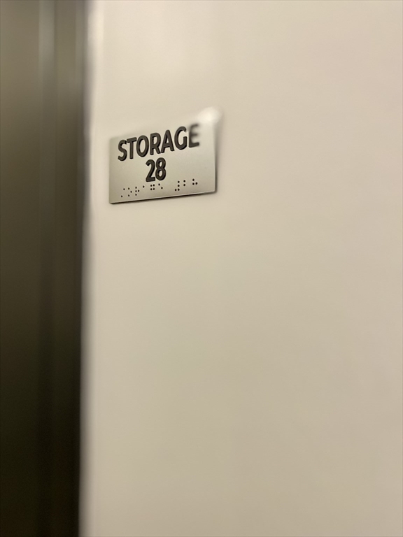 635 Old Post Road, Unit 2203 Sharon, MA 02067 - Photo 29 of 40 a wall with a sign on it