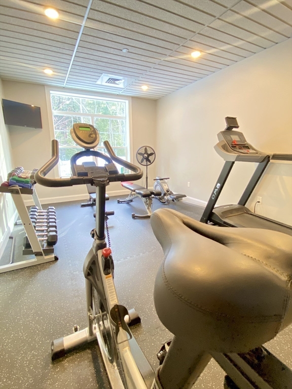 635 Old Post Road, Unit 2203 Sharon, MA 02067 - Photo 31 of 40 a room with gym equipment