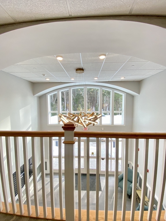 635 Old Post Road, Unit 2203 Sharon, MA 02067 - Photo 34 of 40 a view of a living room and balcony
