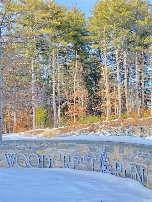 635 Old Post Road, Unit 2203 Sharon, MA 02067 - Photo 38 of 40 a view of a door with wooden floor