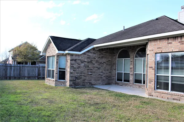 front view of a house with an outdoor space