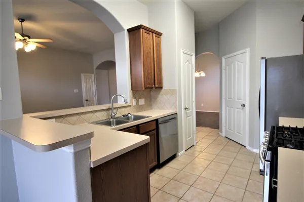 a bathroom with a sink a vanity and a mirror