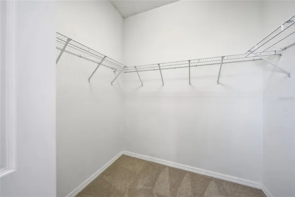 a view of a room with racks on the wall