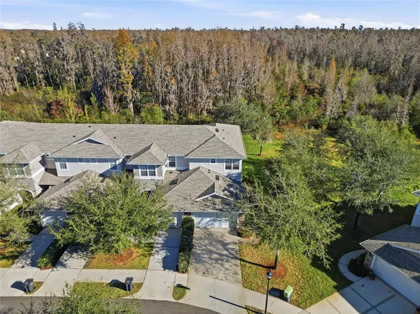 an aerial view of a house with a garden