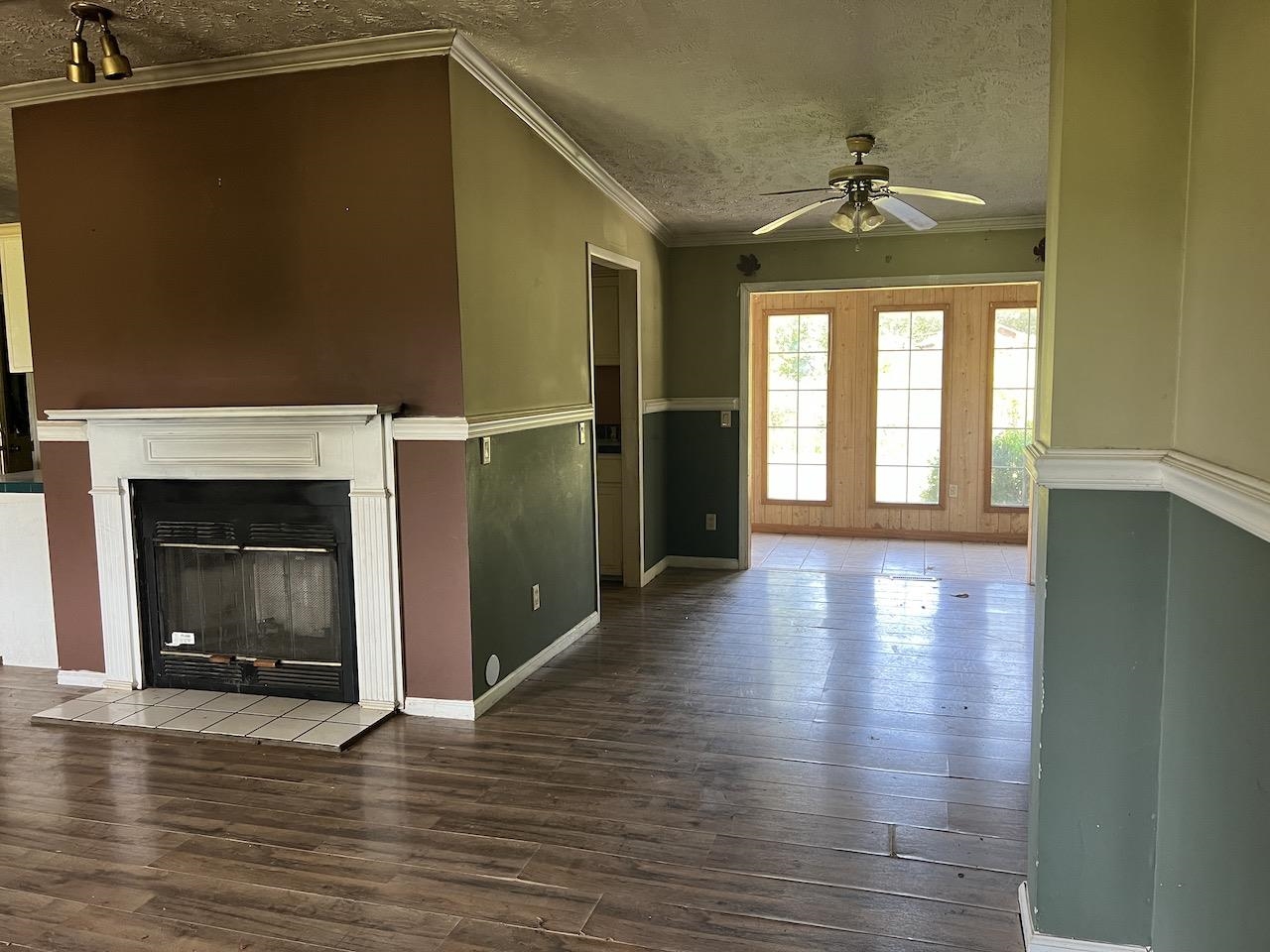 760 Wadsworth Road Henning, TN 38041 - Photo 14 of 15 a view of an empty room with window and wooden floor