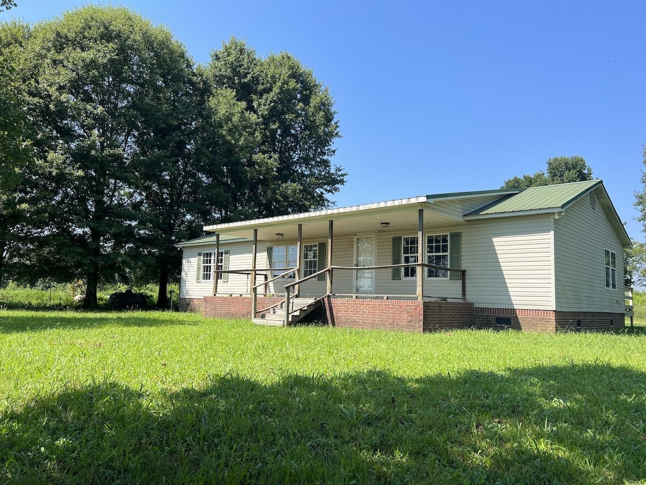 760 Wadsworth Road Henning, TN 38041 - Photo 2 of 15 a front view of house with a garden