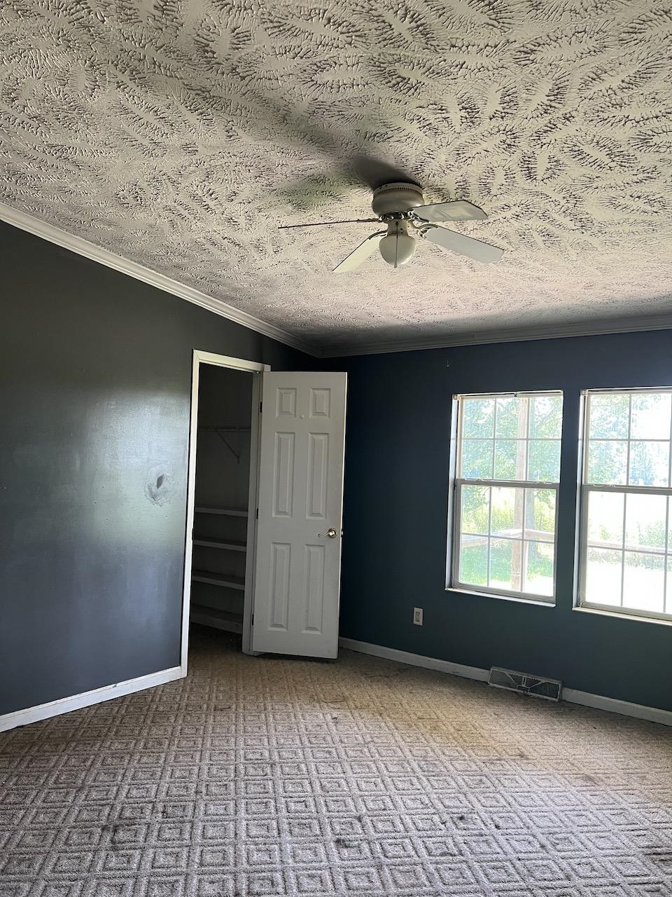 760 Wadsworth Road Henning, TN 38041 - Photo 9 of 15 wooden floor in an empty room with a window
