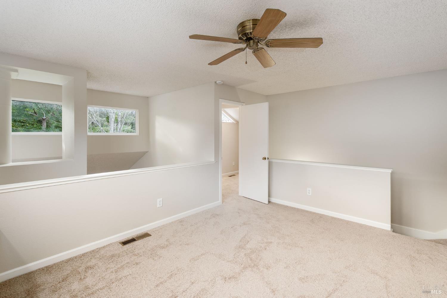 2322 Lakeview Drive Santa Rosa, CA 95405 - Photo 17 of 47 Loft with access to bonus room and storage closet.