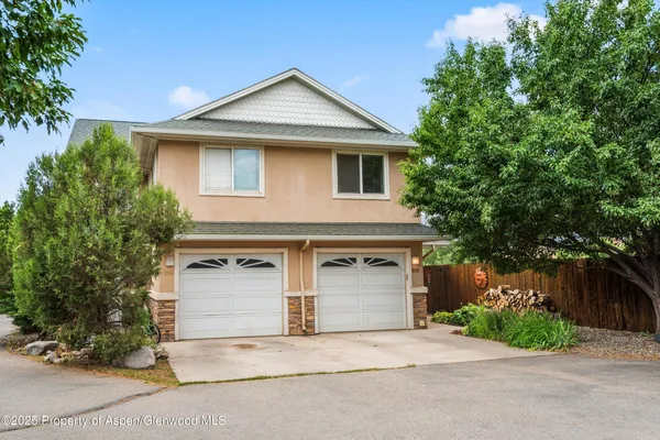 front view of a house with a street