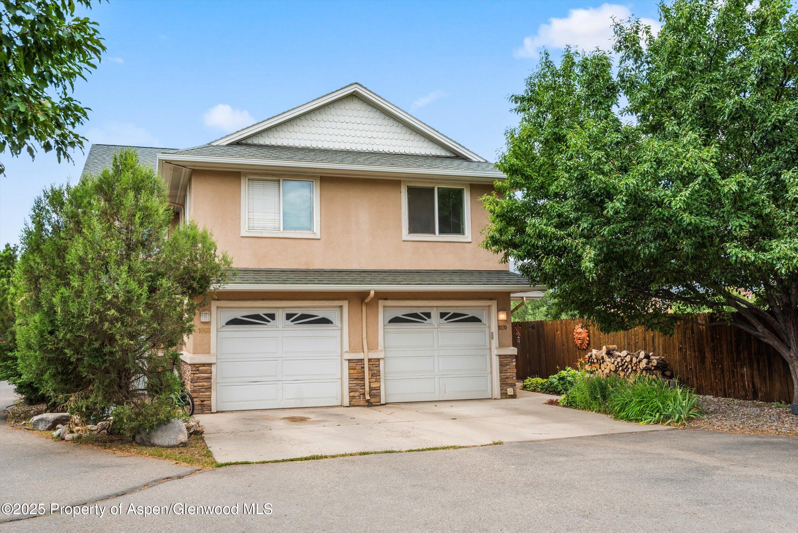 front view of a house with a street
