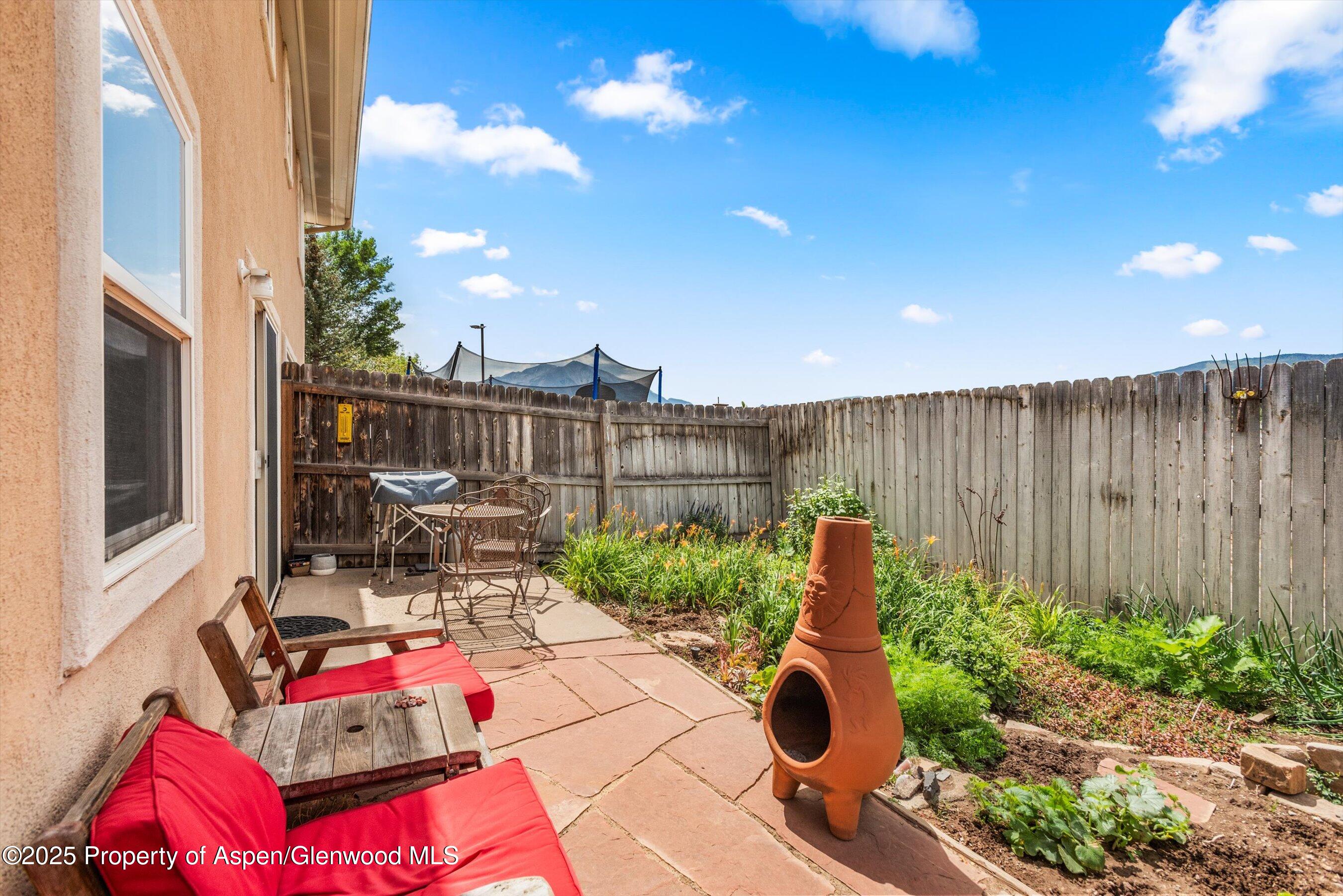1070 Village Road Carbondale, CO 81623 - Photo 19 of 30 a garden view with seating space and potted plants