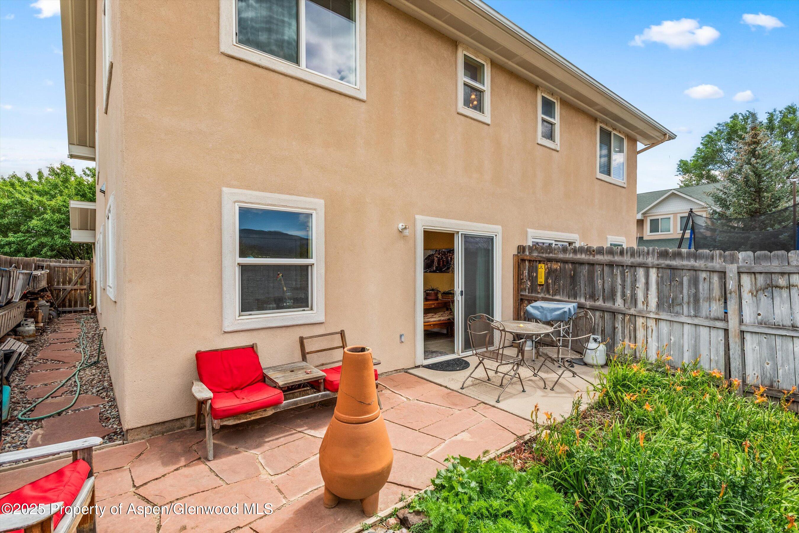 1070 Village Road Carbondale, CO 81623 - Photo 20 of 30 a backyard of a house with outdoor seating
