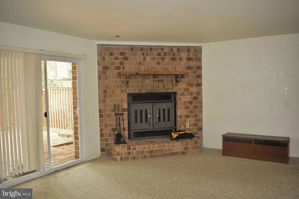 a living room with a fireplace