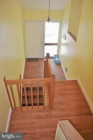a view of wooden floor with windows