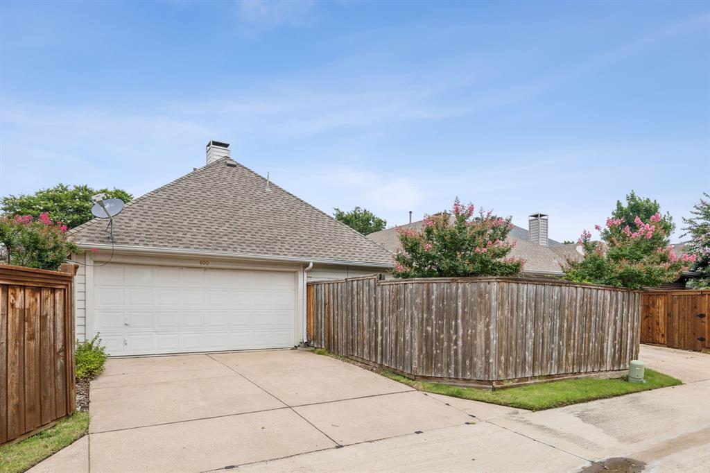 400 Moss Hill Road Irving, TX 75063 - Photo 26 of 26 Back Entrance with Direct Access Garage