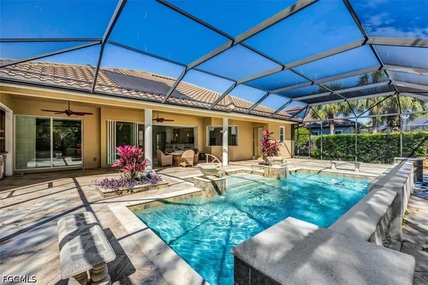 a view of yard with patio