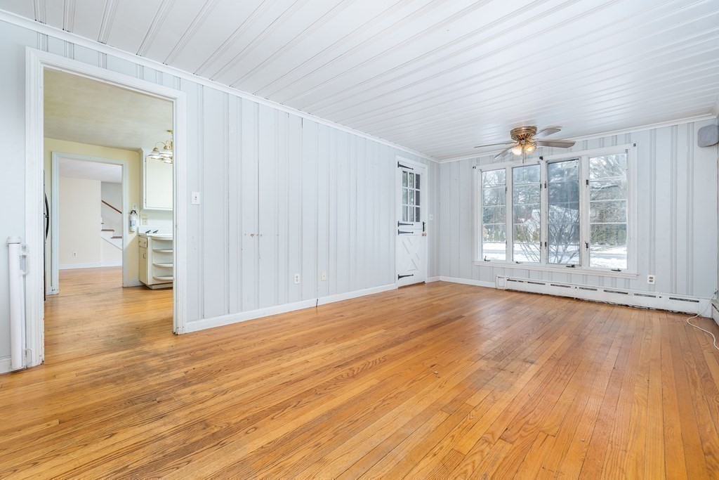 341 Converse Street Longmeadow, MA 01106 - Photo 12 of 34 wooden floor in an empty room with a window