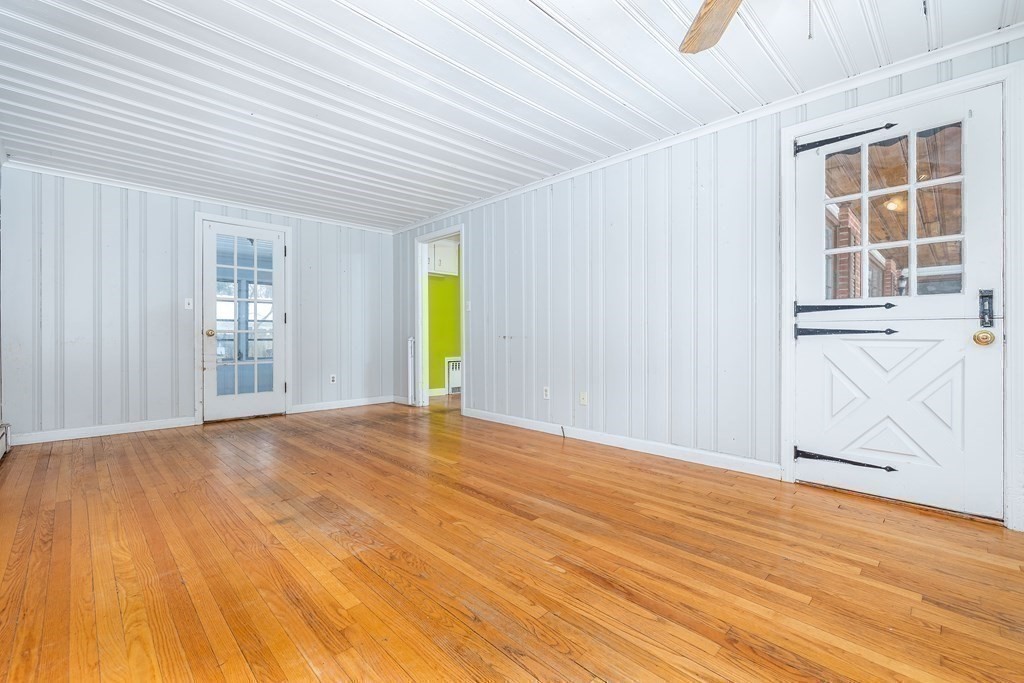 341 Converse Street Longmeadow, MA 01106 - Photo 13 of 34 an empty room with wooden floor and windows