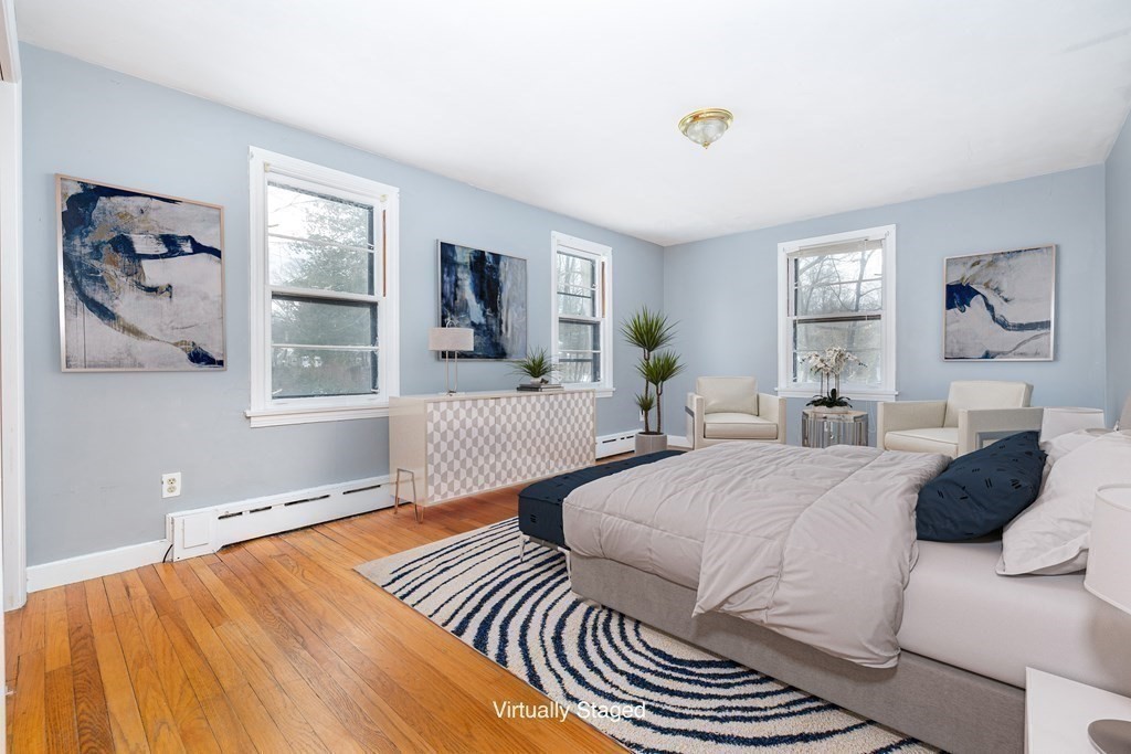341 Converse Street Longmeadow, MA 01106 - Photo 14 of 34 a bedroom with two beds and a large mirror next to a window