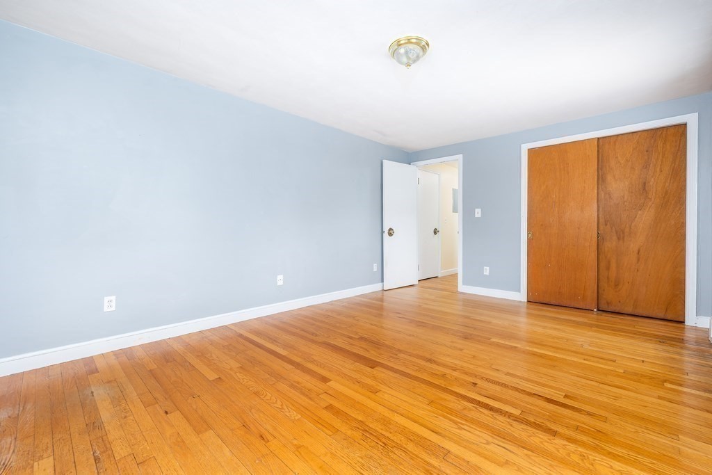 341 Converse Street Longmeadow, MA 01106 - Photo 16 of 34 a view of an empty room and wooden floor