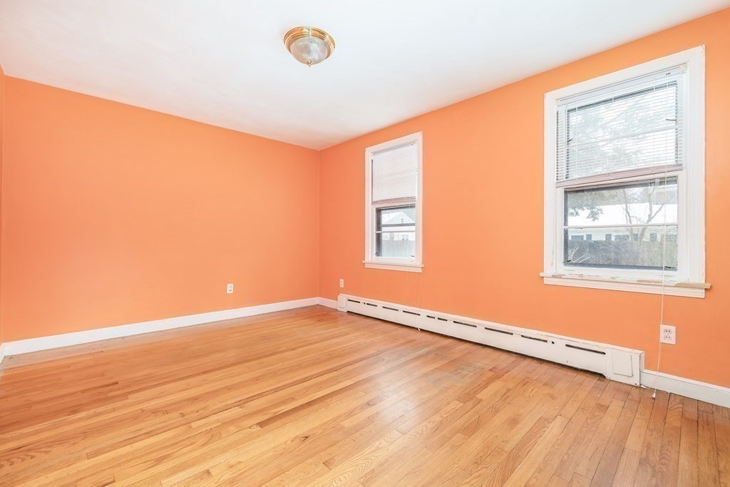 341 Converse Street Longmeadow, MA 01106 - Photo 17 of 34 wooden floor in an empty room with a window