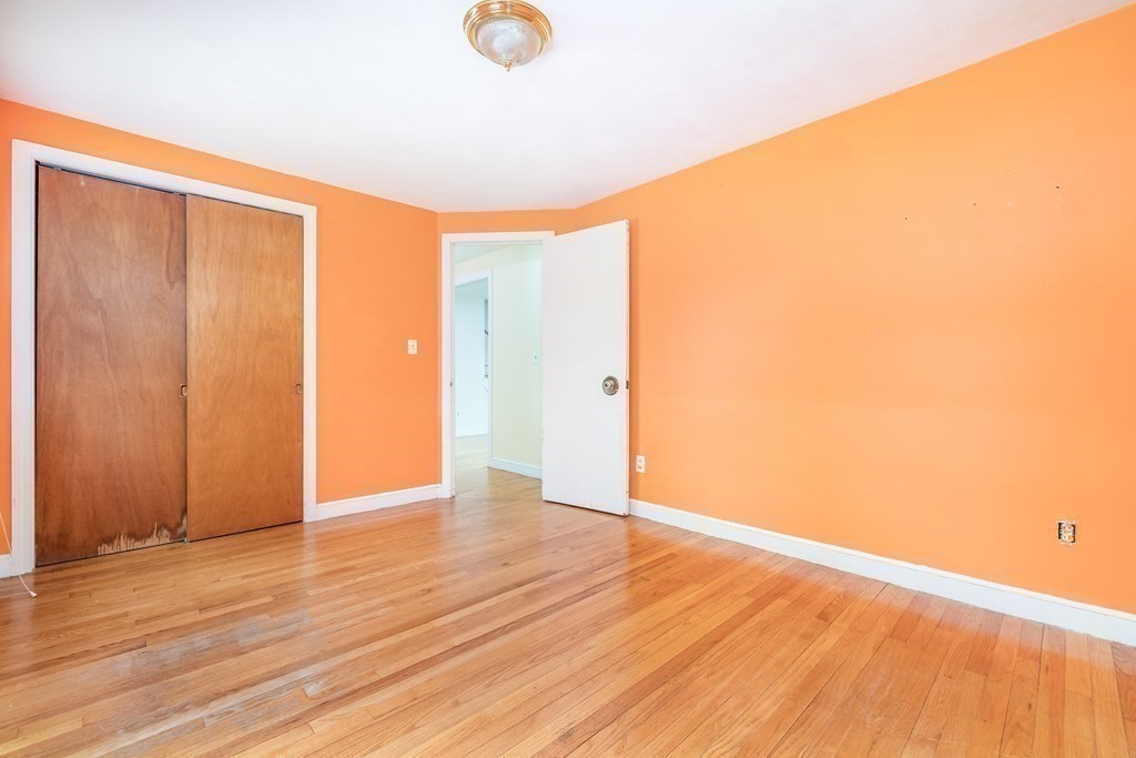 341 Converse Street Longmeadow, MA 01106 - Photo 19 of 34 a view of an empty room with wooden floor