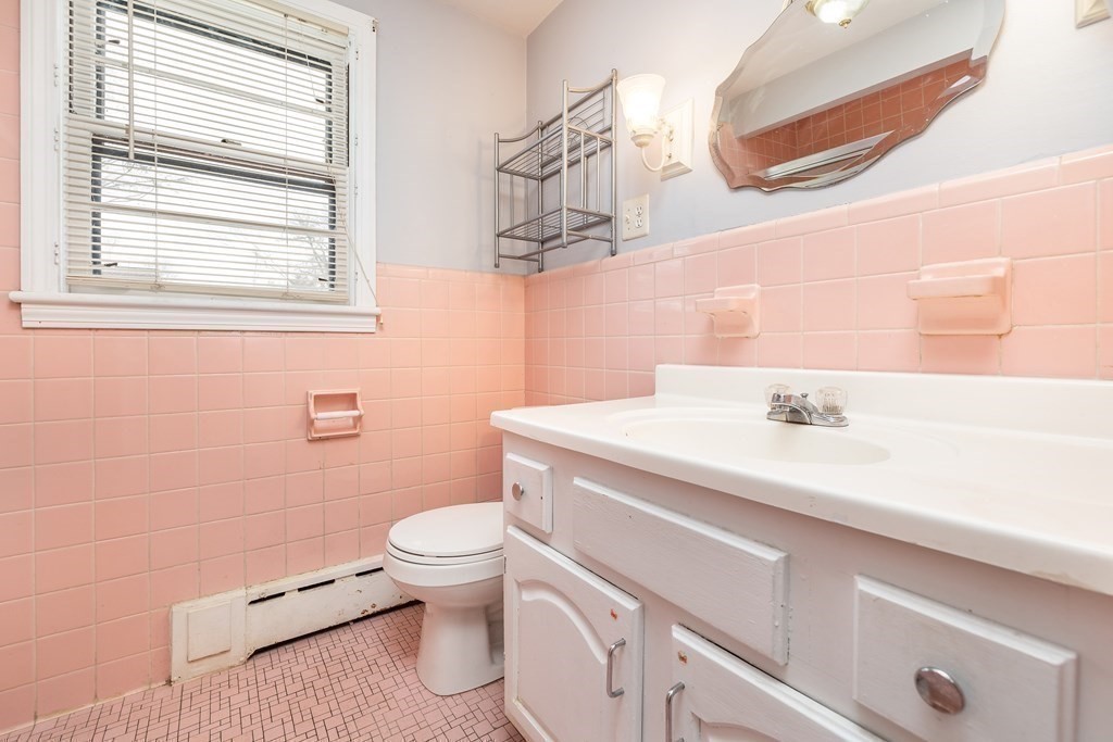 341 Converse Street Longmeadow, MA 01106 - Photo 20 of 34 a bathroom with a sink a toilet and a mirror