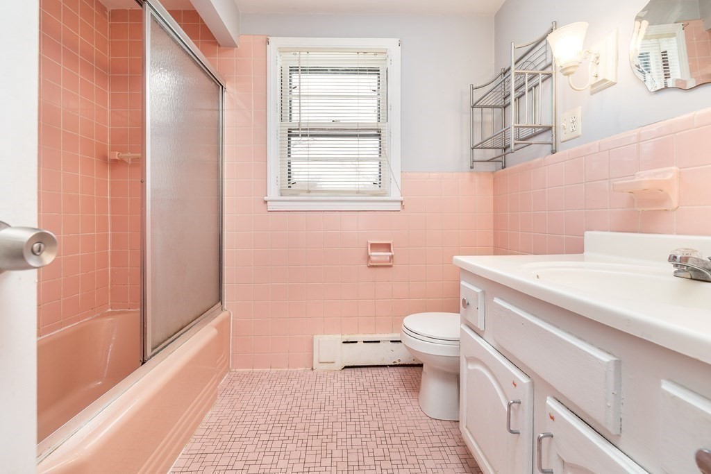 341 Converse Street Longmeadow, MA 01106 - Photo 21 of 34 a bathroom with a sink a toilet and a shower