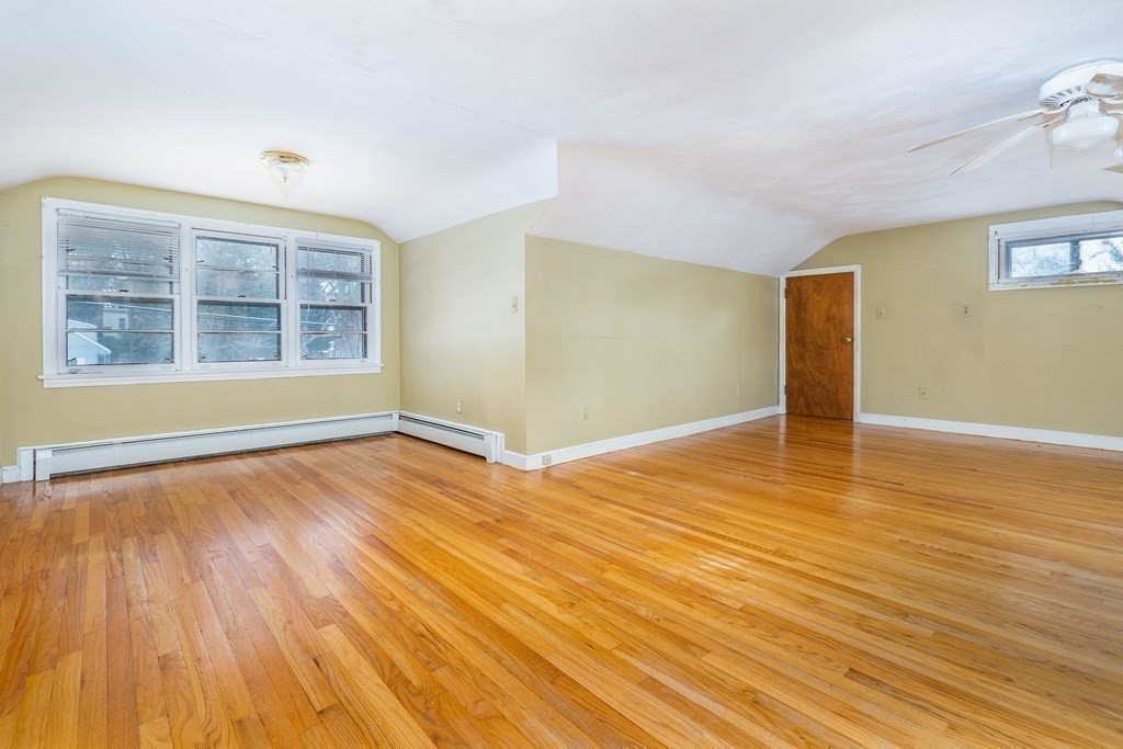 341 Converse Street Longmeadow, MA 01106 - Photo 22 of 34 an empty room with wooden floor and windows