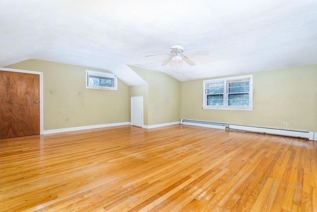 341 Converse Street Longmeadow, MA 01106 - Photo 23 of 34 a view of an empty room with wooden floor and a window