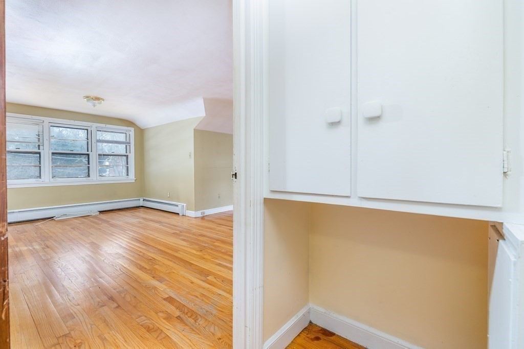 341 Converse Street Longmeadow, MA 01106 - Photo 24 of 34 an empty room with wooden floor and windows