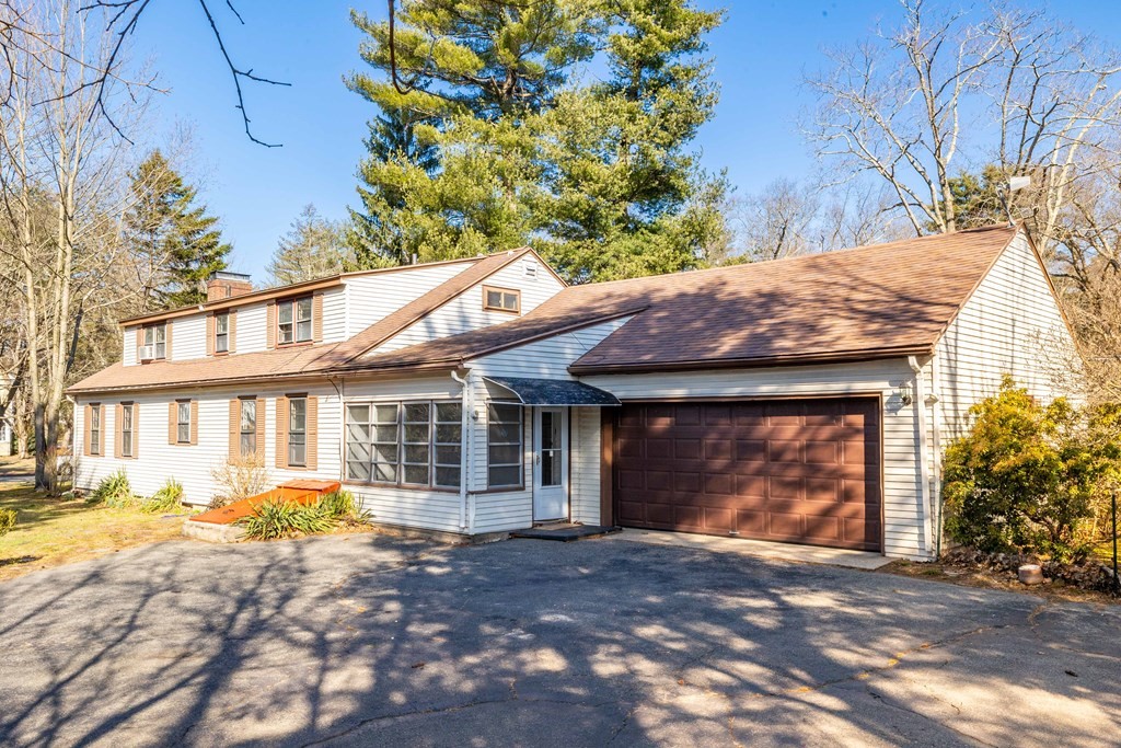 341 Converse Street Longmeadow, MA 01106 - Photo 34 of 34 a front view of a house with a yard and potted plants