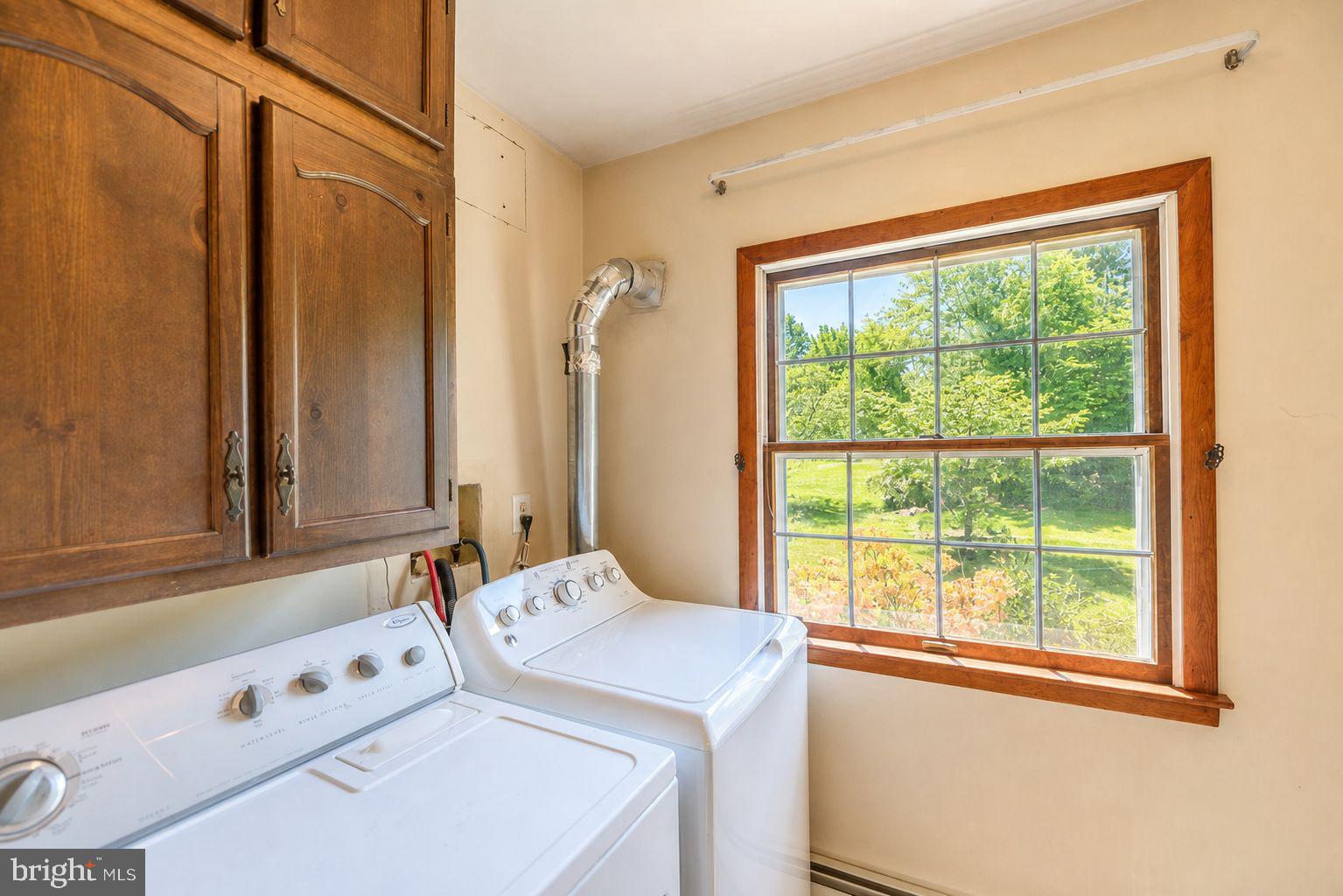 223 Trythall Road Elverson, PA 19520 - Photo 40 of 78 a bathroom with a sink and a window