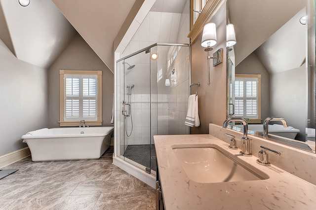 37W634 Grey Barn Road St. Charles, IL 60175 - Photo 19 of 37 a bathroom with a sink a toilet a mirror and bathtub