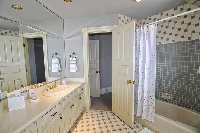 37W634 Grey Barn Road St. Charles, IL 60175 - Photo 22 of 37 a spacious bathroom with a double vanity sink a mirror a bathtub and shower