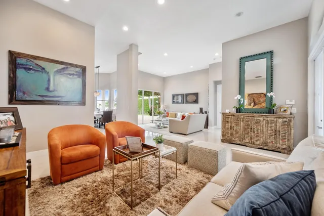 a view of a dining room with furniture window and outside view