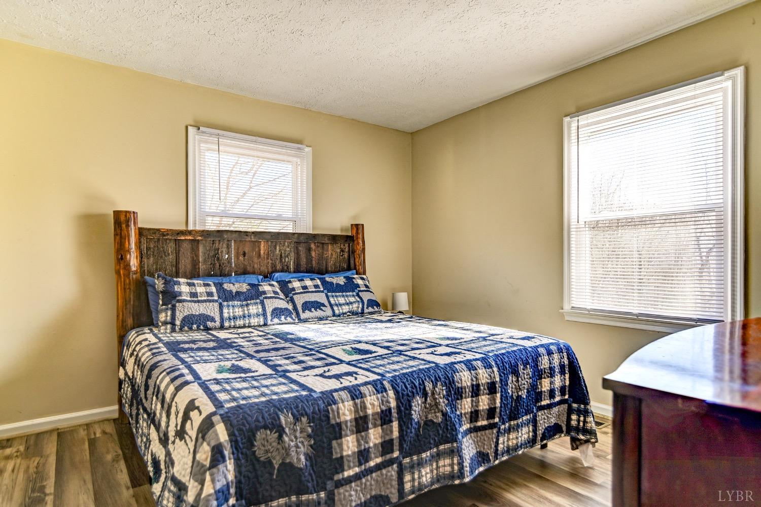 207 Matohe Road Monroe, VA 24574 - Photo 10 of 34 a bedroom with a bed and a window