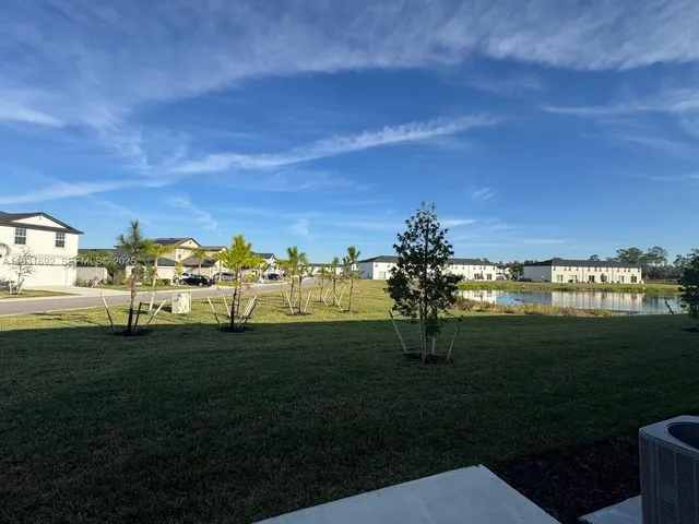 a view of a golf course with a lake